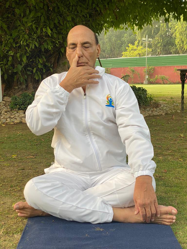 Raksha Mantri exhorts people to practice Yoga regularly to keep body & mind healthy