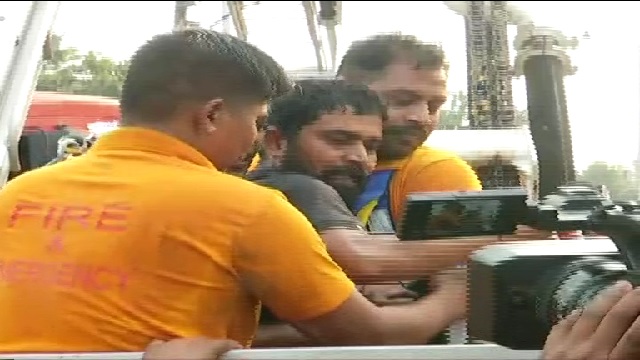 Muktikant safely rescued from atop hoarding after 5-hour operation by fire personnel