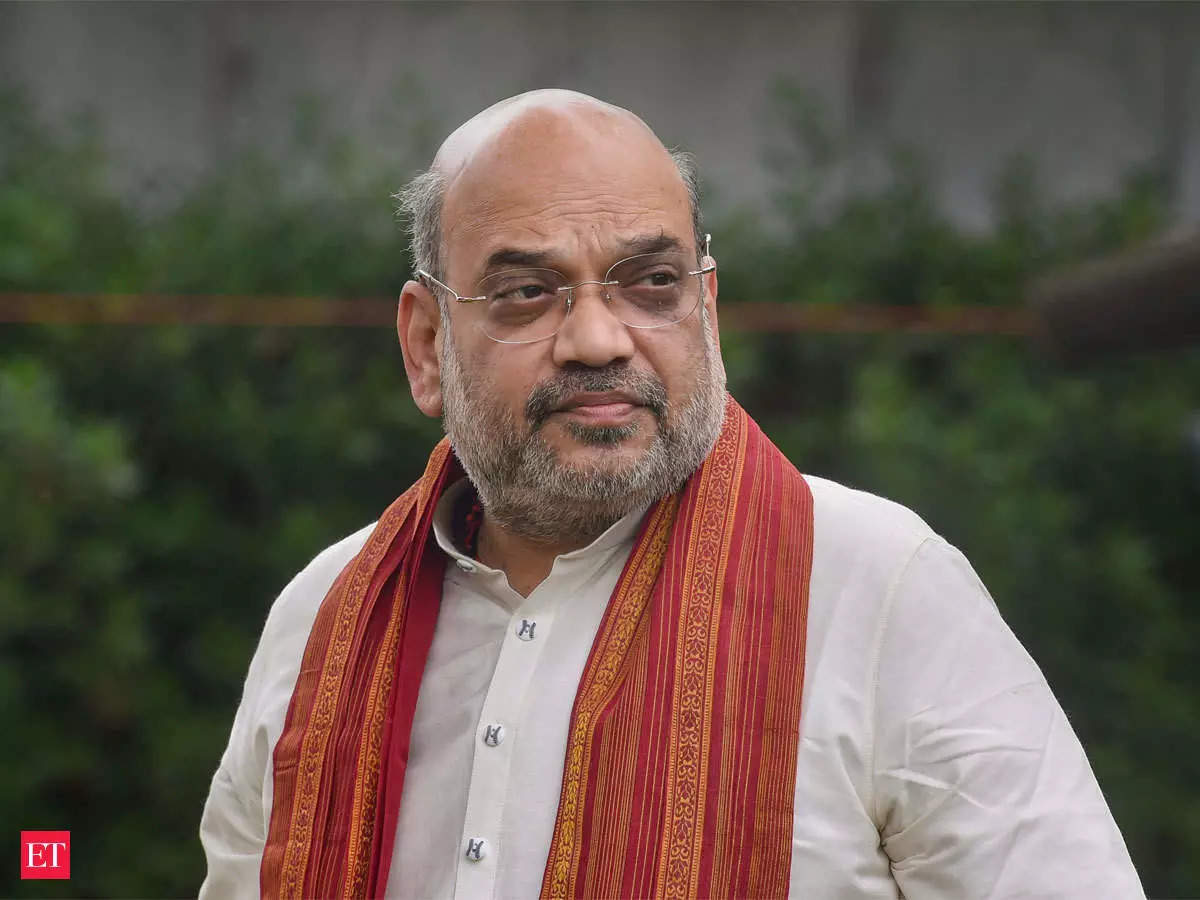 Amit Shah congratulates Prime Minister Shri Narendra Modi on completing 20 years of public service 