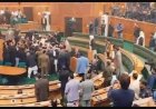 Chaos erupted in the J&K Assembly when Engineer Rashid's brother displayed a banner regarding Article 370, resulting in clashes between the BJP and the NC.