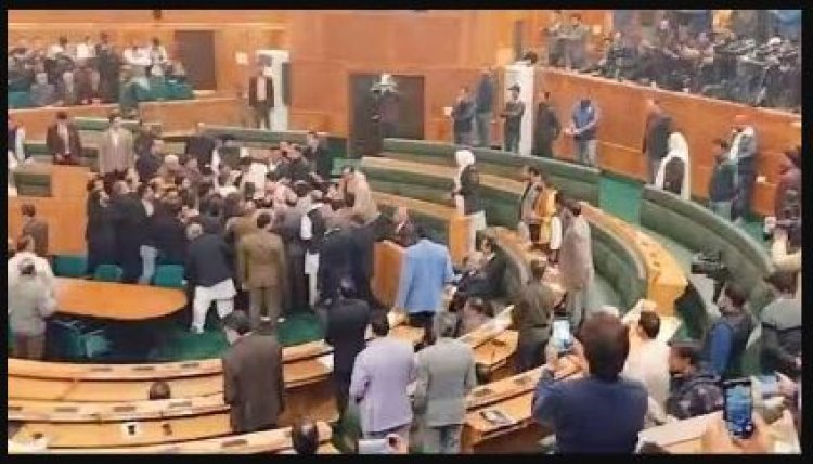 Chaos erupted in the J&K Assembly when Engineer Rashid's brother displayed a banner regarding Article 370, resulting in clashes between the BJP and the NC.